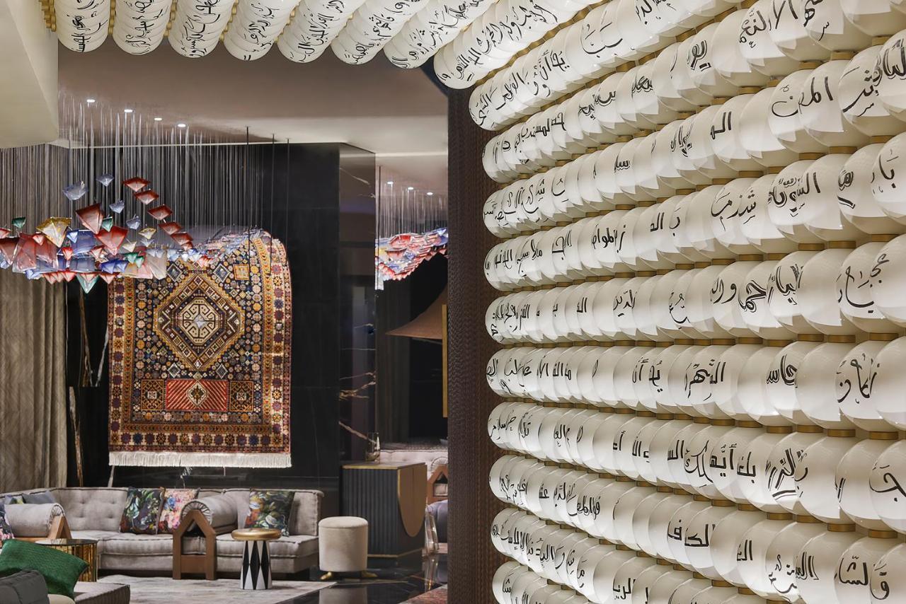 Hotel W Dubai - Mina Seyahi (Adults Only) Esterno foto The wall of the hotel lobby