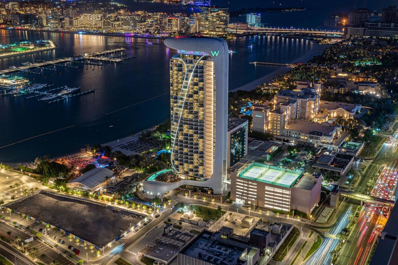 Hotel W Dubai - Mina Seyahi (Adults Only) Esterno foto The hotel at night