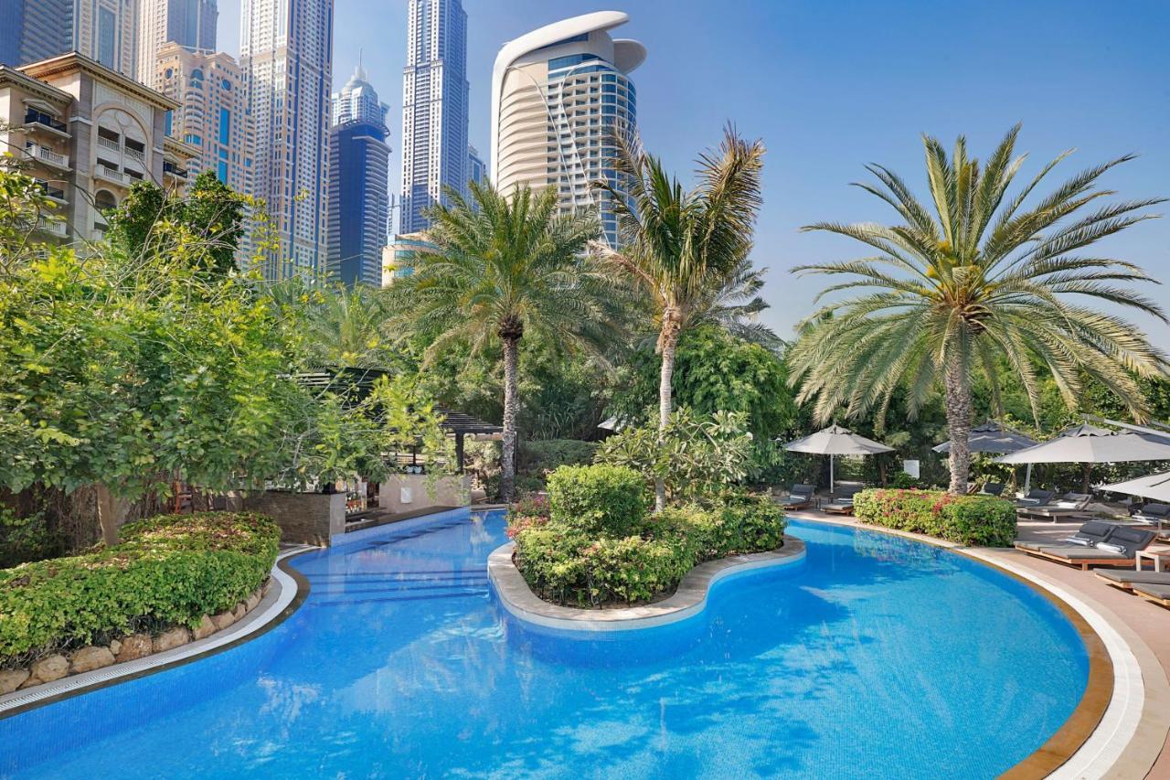 Hotel W Dubai - Mina Seyahi (Adults Only) Esterno foto The swimming pool at the hotel